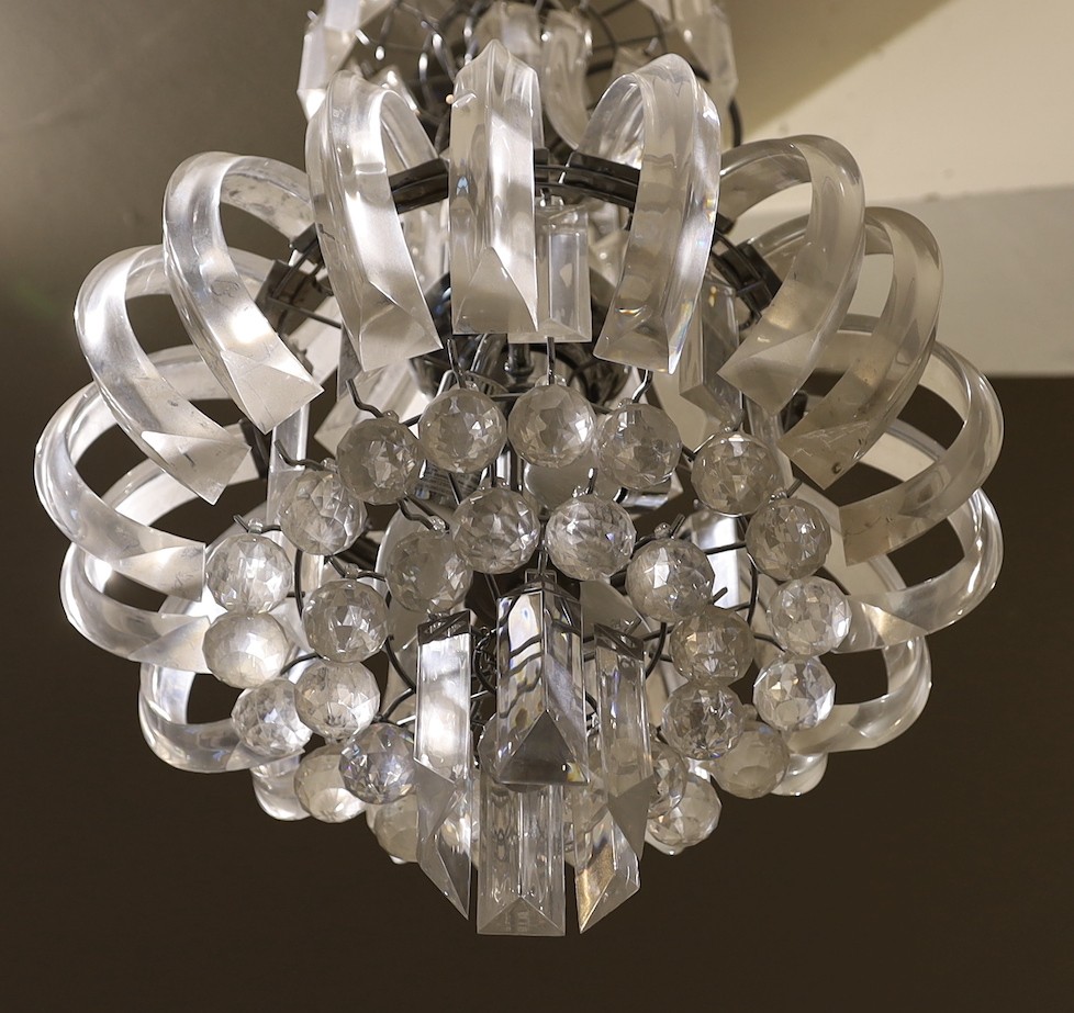 A pair of contemporary perspex chandeliers